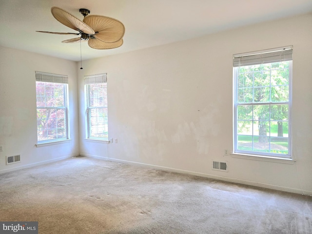10 Honeyflower, Bordentown, NJ 08620 - carpeted spare room with plenty of natural light, ceiling fan, and baseboards