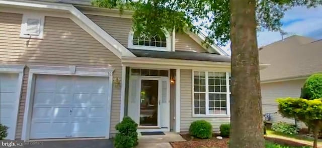 10 Honeyflower, Bordentown, NJ 08620 - doorway to property with a garage
