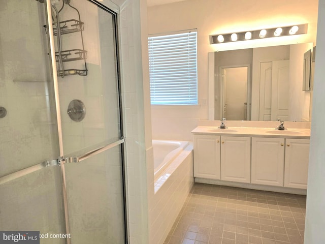 10 Honeyflower, Bordentown, NJ 08620 - full bath with a stall shower, a garden tub, double vanity, and tile patterned flooring