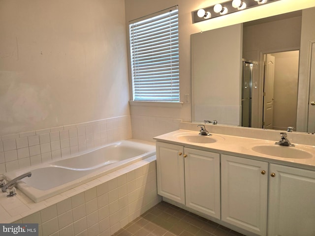 10 Honeyflower, Bordentown, NJ 08620 - full bathroom featuring a bath, tile patterned floors, a shower stall, and double vanity