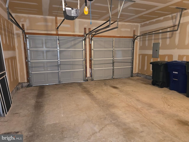 10 Honeyflower, Bordentown, NJ 08620 - garage featuring electric panel and a garage door opener