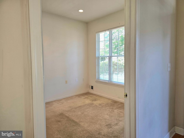 10 Honeyflower, Bordentown, NJ 08620 - empty room with healthy amount of natural light, carpet flooring, baseboards, and recessed lighting