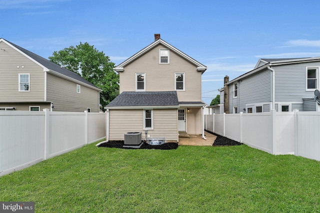 59 Jarvis St, Pemberton, NJ 08068 - back of house with central air condition unit and a chimney