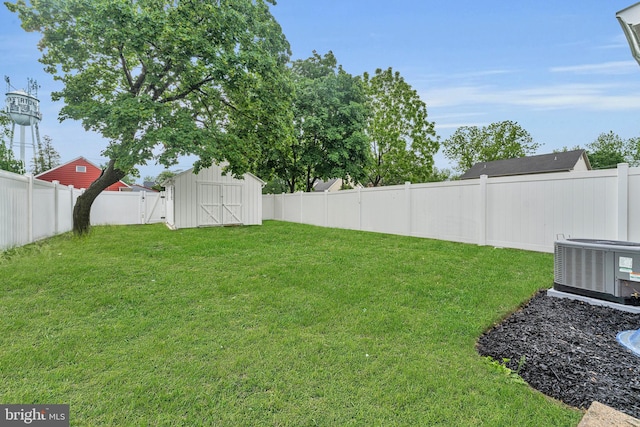 59 Jarvis St, Pemberton, NJ 08068 - view of yard featuring central AC, a storage unit, and an outdoor structure