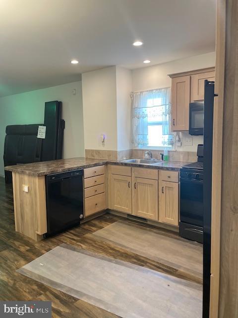 319 Crestmont St, Reading, PA 19611 - kitchen with black appliances, a sink, light brown cabinets, dark wood-style floors, and recessed lighting