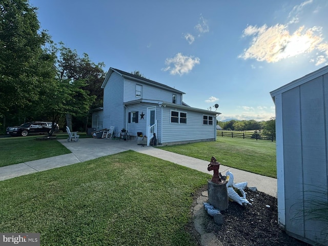 view of front facade featuring entry steps and a patio