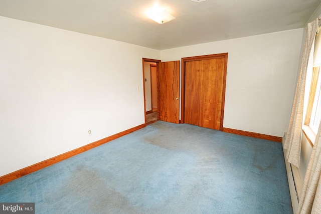 407 Elizabeth St, Georgetown, DE 19947 - empty room with carpet floors and baseboards