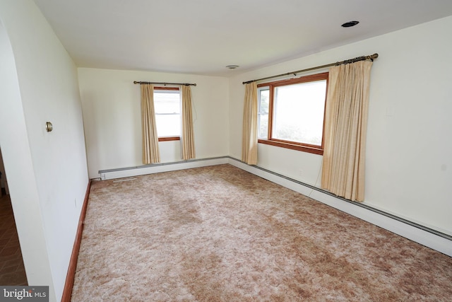 407 Elizabeth St, Georgetown, DE 19947 - carpeted spare room featuring a baseboard radiator and baseboards