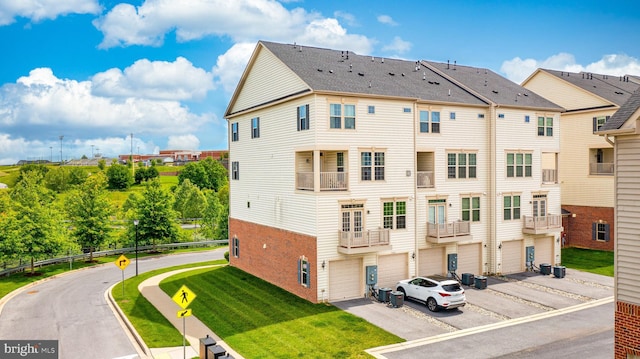 5831 Rochefort St, Ijamsville, MD 21754 - view of building exterior featuring driveway and an attached garage