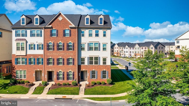 5831 Rochefort St, Ijamsville, MD 21754 - view of front of house featuring a residential view and brick siding