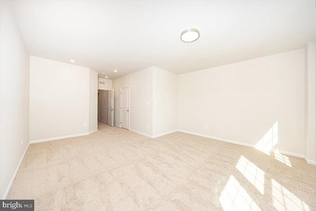 5831 Rochefort St, Ijamsville, MD 21754 - empty room featuring light colored carpet, baseboards, and recessed lighting