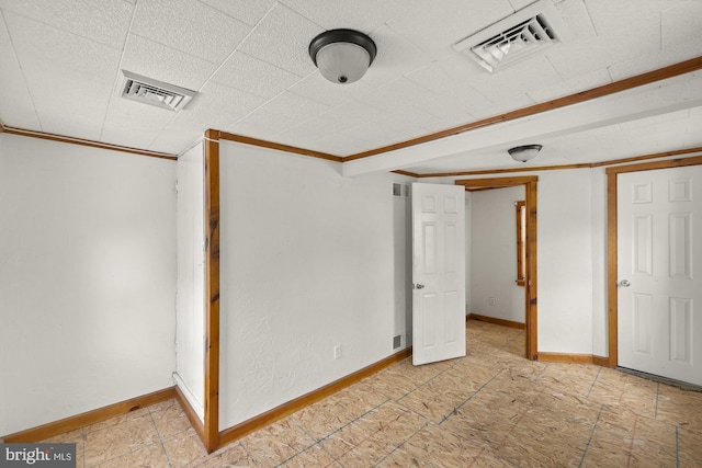finished below grade area with baseboards and crown molding