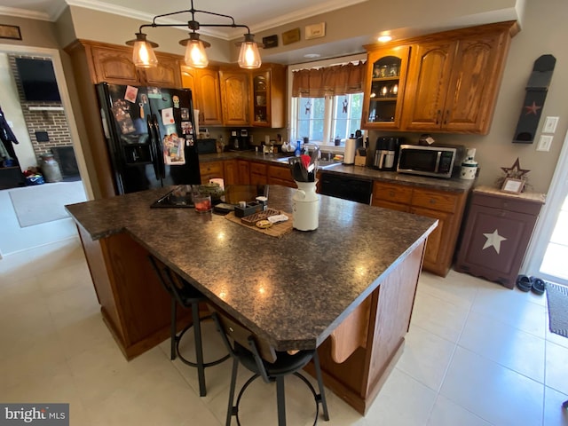 4 Tall Oaks Dr, Pottsville, PA 17901 - kitchen featuring black appliances, brown cabinets, ornamental molding, and dark countertops