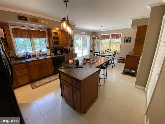 4 Tall Oaks Dr, Pottsville, PA 17901 - kitchen with brown cabinetry, black appliances, dark countertops, a sink, and crown molding