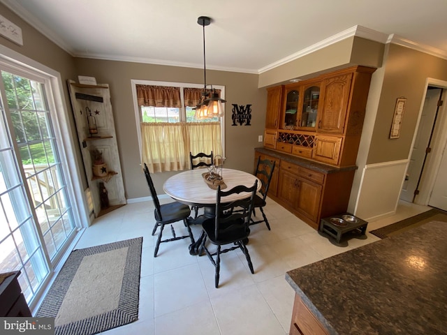 4 Tall Oaks Dr, Pottsville, PA 17901 - dining area featuring a chandelier, ornamental molding, light tile patterned floors, and baseboards