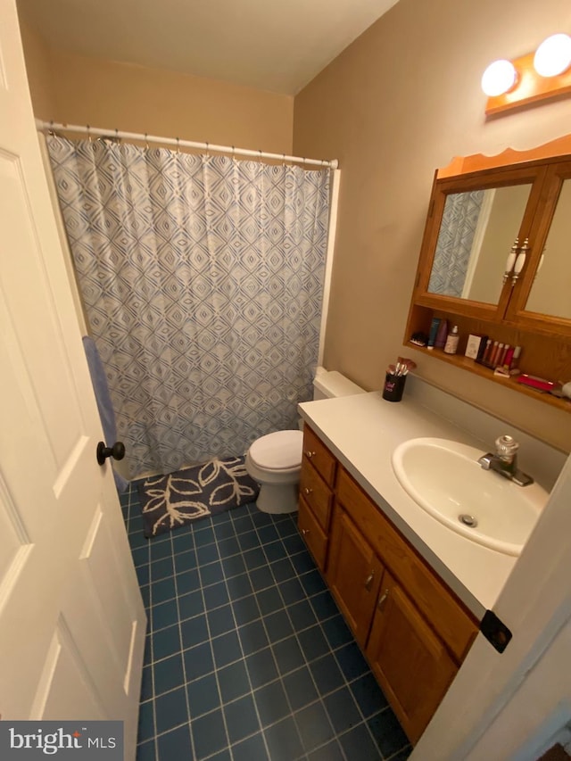 4 Tall Oaks Dr, Pottsville, PA 17901 - full bath with vanity, toilet, tile patterned floors, and a shower with shower curtain