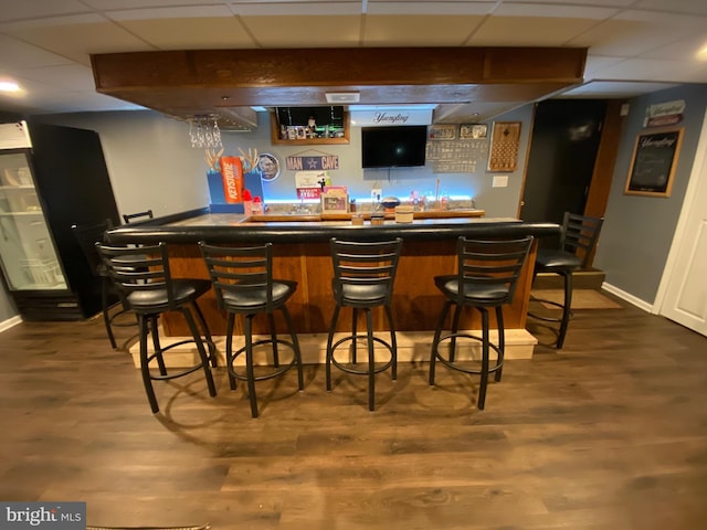 4 Tall Oaks Dr, Pottsville, PA 17901 - indoor wet bar featuring a paneled ceiling, dark wood finished floors, and baseboards