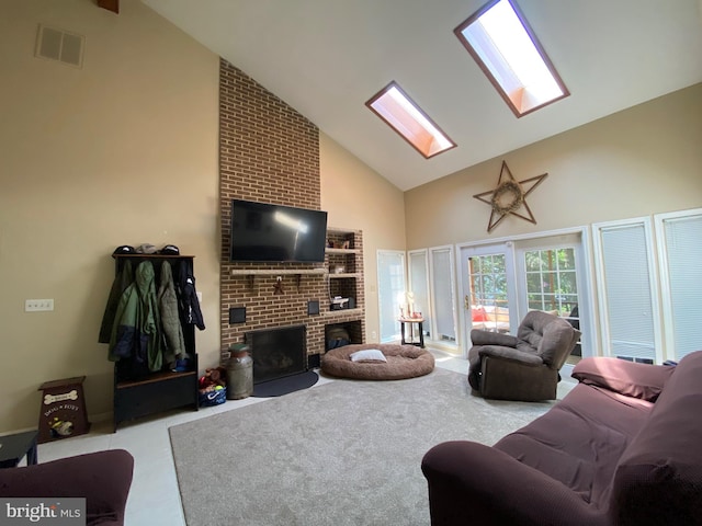 4 Tall Oaks Dr, Pottsville, PA 17901 - carpeted living area featuring high vaulted ceiling, a brick fireplace, and a skylight