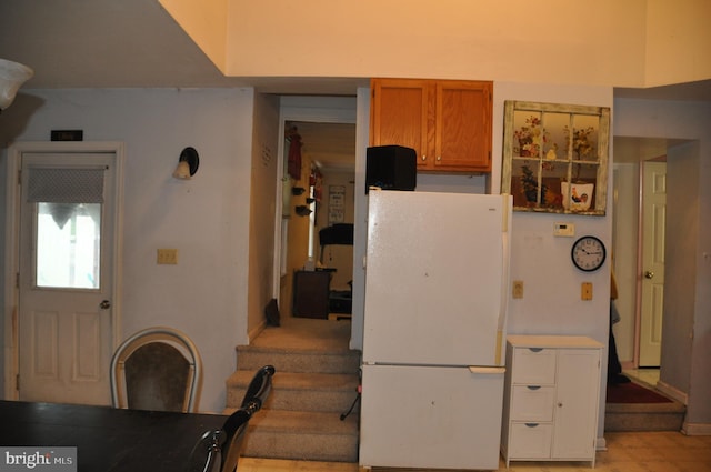2147 Cloverleaf Rd, Mount Joy, PA 17552 - kitchen featuring freestanding refrigerator and brown cabinetry