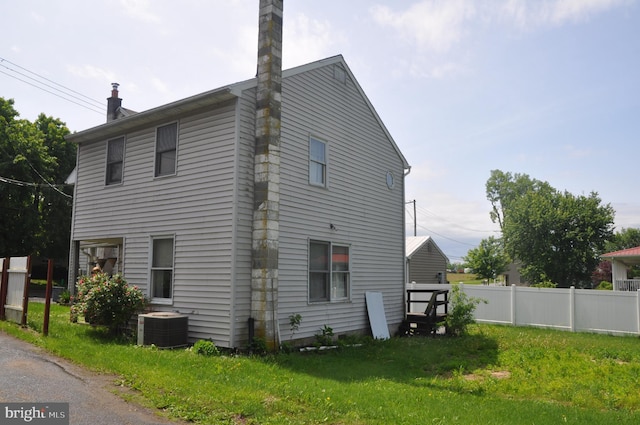 2147 Cloverleaf Rd, Mount Joy, PA 17552 - view of side of property with central AC unit and a chimney