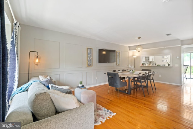 9642 Lambeth Ct, Columbia, MD 21046 - living room featuring light wood finished floors