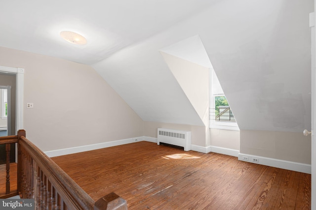 8 E Oak Ave, Moorestown, NJ 08057 - bonus room featuring radiator, wood-type flooring, baseboards, and lofted ceiling