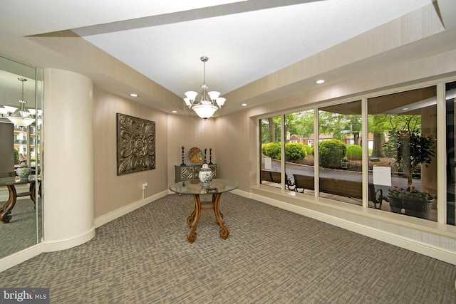 hallway with a chandelier, carpet, baseboards, and recessed lighting