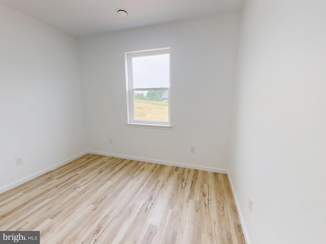 294 Meadow Flower Cir, Bellefonte, PA 16823 - spare room with wood finished floors and baseboards