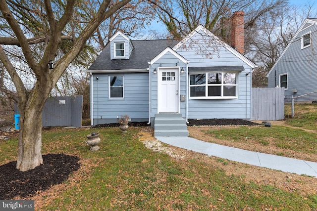 view of front of home with roof with shingles