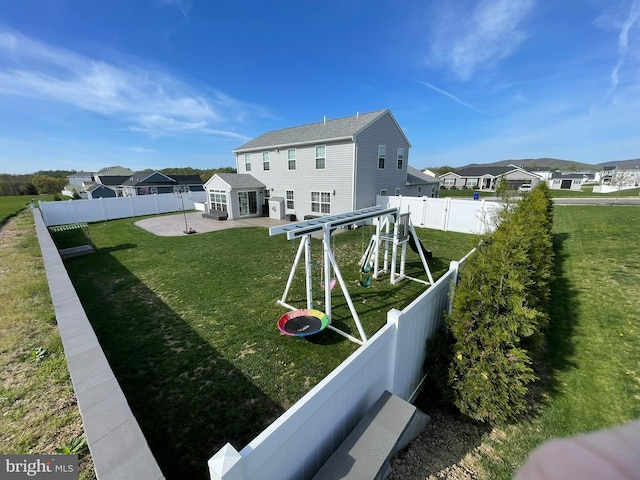 128 Eagle Rd, Dillsburg, PA 17019 - back of property featuring a patio area, a residential view, and a playground