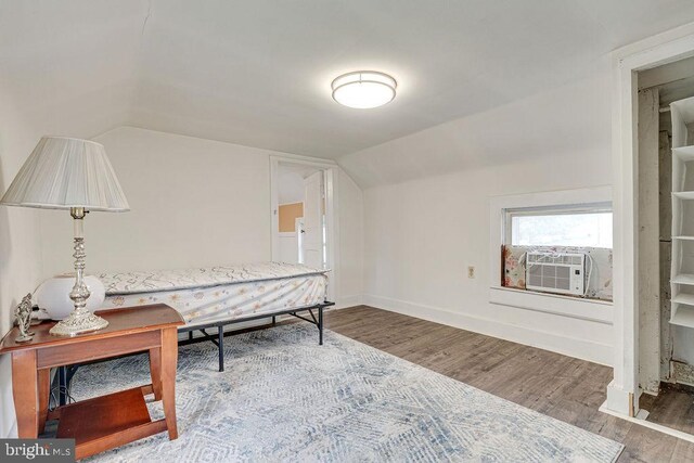 340 Andrews Rd, Strasburg, VA 22657 - sitting room featuring wood finished floors, lofted ceiling, cooling unit, and baseboards