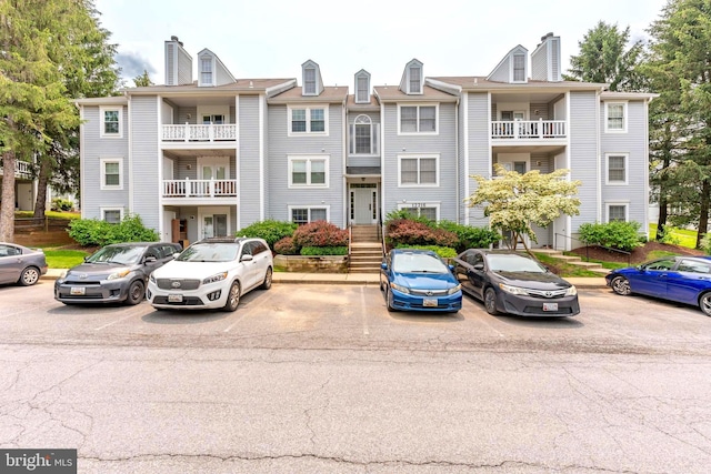 12216 Eagles Nest Ct Unit G, Germantown, MD 20874 - view of building exterior with uncovered parking