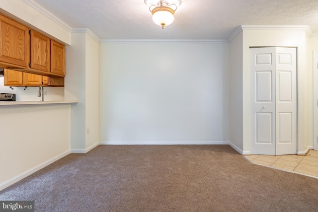 12216 Eagles Nest Ct Unit G, Germantown, MD 20874 - unfurnished dining area with light carpet, crown molding, and baseboards
