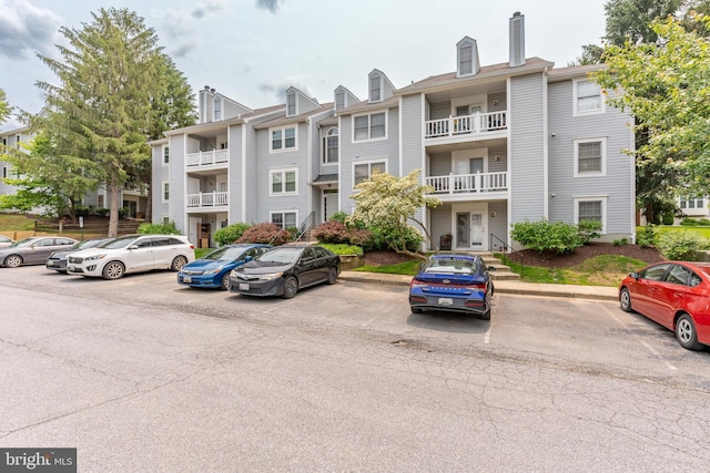 12216 Eagles Nest Ct Unit G, Germantown, MD 20874 - view of building exterior with uncovered parking