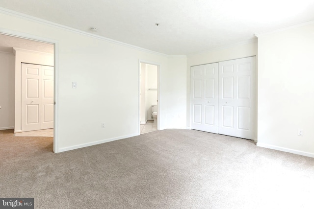 12216 Eagles Nest Ct Unit G, Germantown, MD 20874 - unfurnished bedroom with carpet, crown molding, baseboards, a closet, and connected bathroom