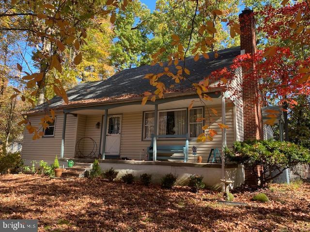 349 Hartford Rd, Mount Laurel, NJ 08054 - view of front of home with a porch and a chimney