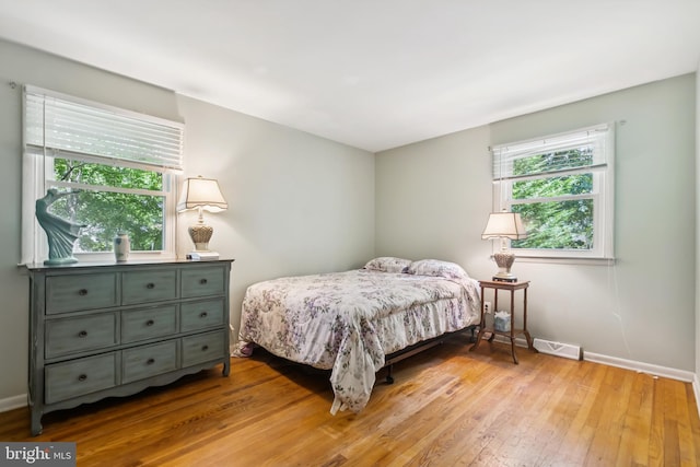 349 Hartford Rd, Mount Laurel, NJ 08054 - bedroom featuring light wood-type flooring and baseboards