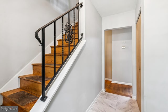 349 Hartford Rd, Mount Laurel, NJ 08054 - stairway featuring marble look tile flooring and baseboards