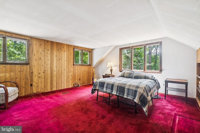 349 Hartford Rd, Mount Laurel, NJ 08054 - carpeted bedroom featuring multiple windows, wooden walls, and lofted ceiling