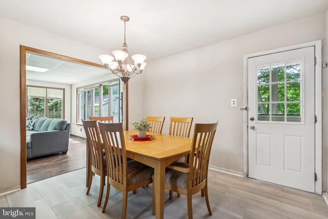 349 Hartford Rd, Mount Laurel, NJ 08054 - dining room with plenty of natural light and a chandelier