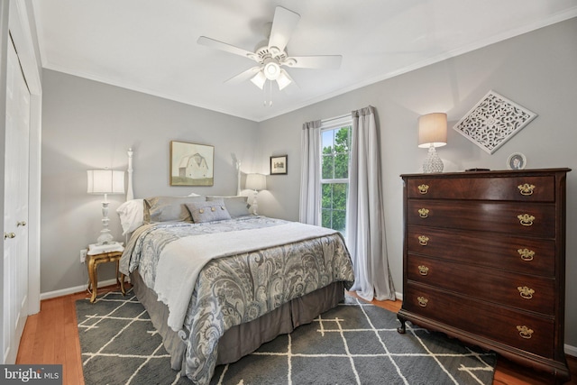 11115 Sceptre Ridge Ter, Germantown, MD 20876 - bedroom with dark wood-type flooring, crown molding, and a ceiling fan