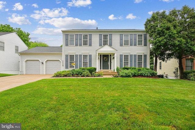11115 Sceptre Ridge Ter, Germantown, MD 20876 - colonial inspired home featuring a garage, driveway, and a front lawn