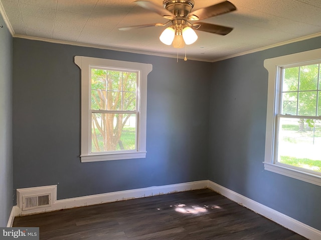 13304 Crain Hwy, Brandywine, MD 20613 - spare room with healthy amount of natural light, crown molding, dark wood finished floors, and ceiling fan