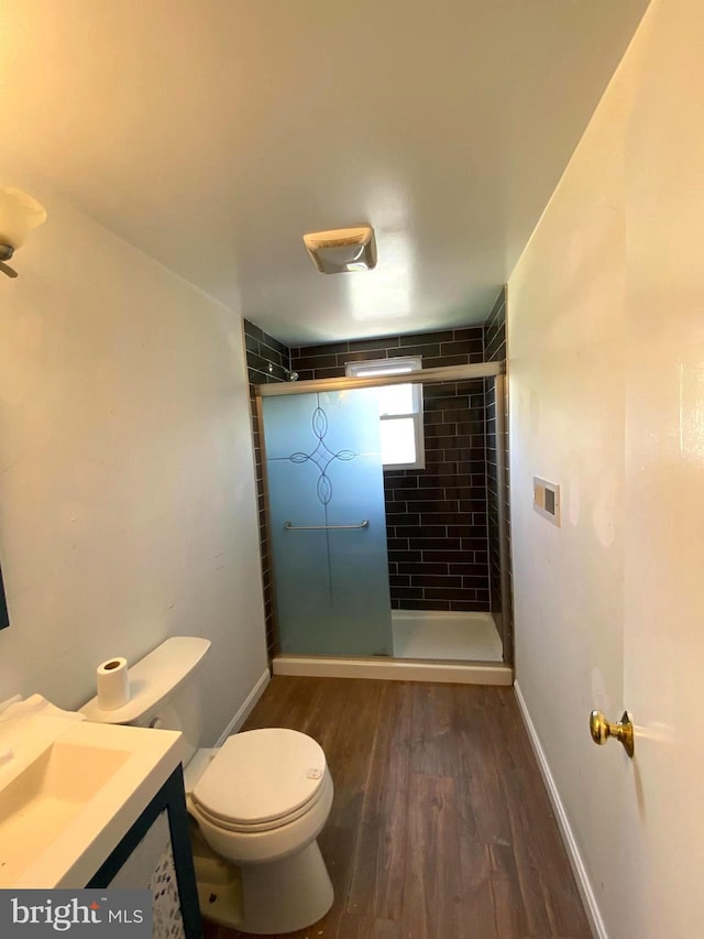 13304 Crain Hwy, Brandywine, MD 20613 - full bath with wood finished floors, a tile shower, and vanity