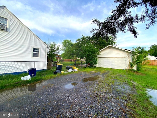13304 Crain Hwy, Brandywine, MD 20613 - view of property exterior featuring a detached garage and an outbuilding