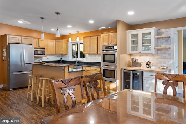1733 Lockhart St, Toms River, NJ 08757 - kitchen with stainless steel appliances, wine cooler, decorative backsplash, a kitchen bar, and dark wood-style flooring