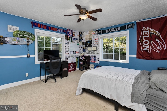 1733 Lockhart St, Toms River, NJ 08757 - carpeted bedroom featuring a textured ceiling, a desk, ceiling fan, and baseboards