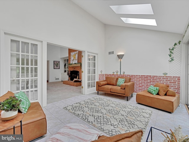 320 N Ridge Rd, Reinholds, PA 17569 - carpeted living room featuring a skylight, tile patterned flooring, a fireplace, and high vaulted ceiling
