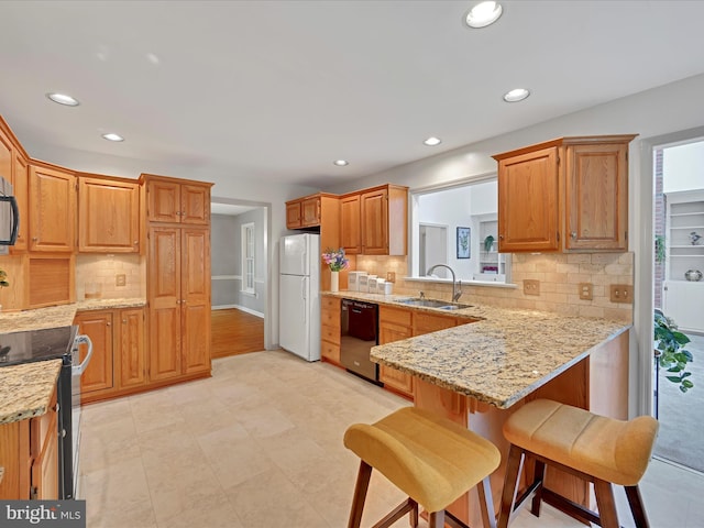 320 N Ridge Rd, Reinholds, PA 17569 - kitchen featuring black dishwasher, a sink, freestanding refrigerator, electric range, and recessed lighting
