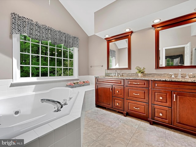 320 N Ridge Rd, Reinholds, PA 17569 - full bathroom with lofted ceiling, double vanity, healthy amount of natural light, a whirlpool tub, and recessed lighting